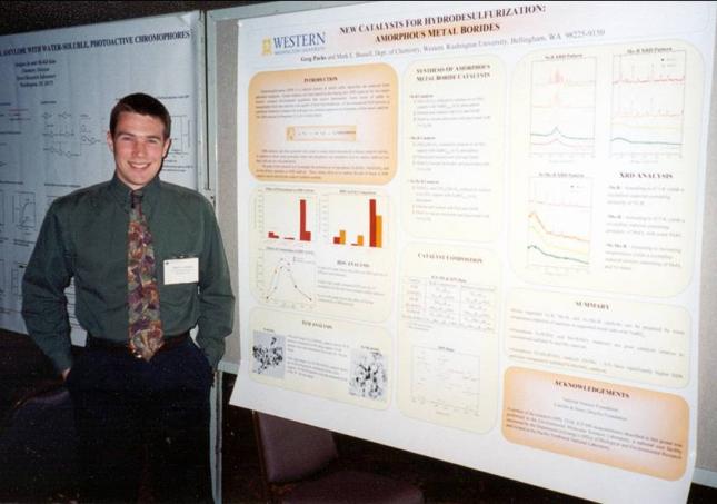Greg Parks standing in front of poster at ACS