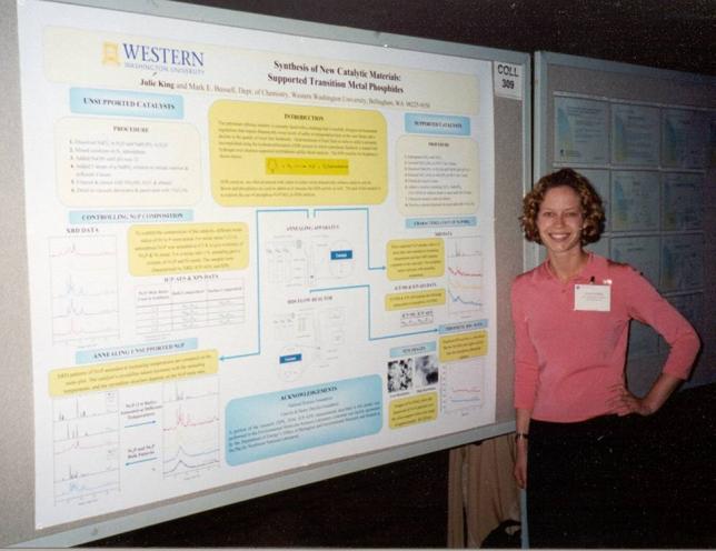 Julie King standing in front of poster at ACS meeting