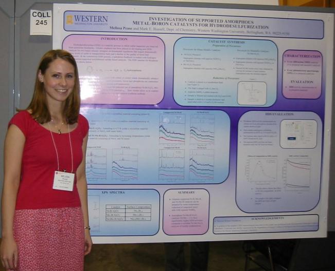  Melissa Pease standing in front of poster at ACS