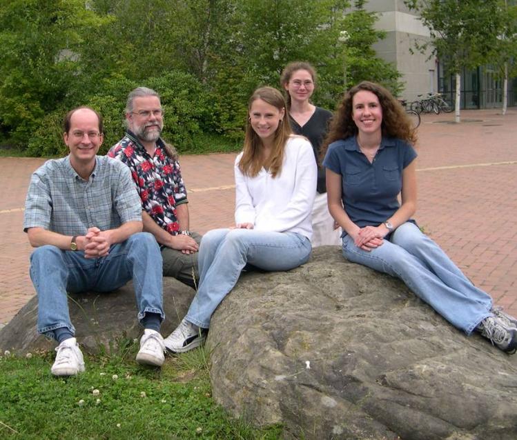 2003-2004 group outside chemistry building on grass and rocks
