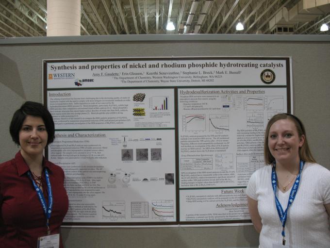 Erin Gleason and Amy Gaudette standing in front of poster at ACS meeting