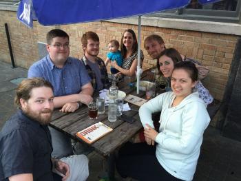 Murphy group out at drinks after student completed thesis defense 
